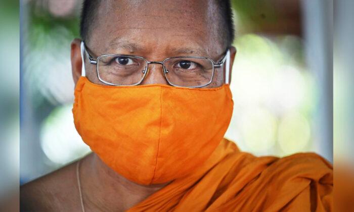 Buddhist Monks Transform Plastic Bottles, Waste Into Monastic Robes, Masks in Thailand