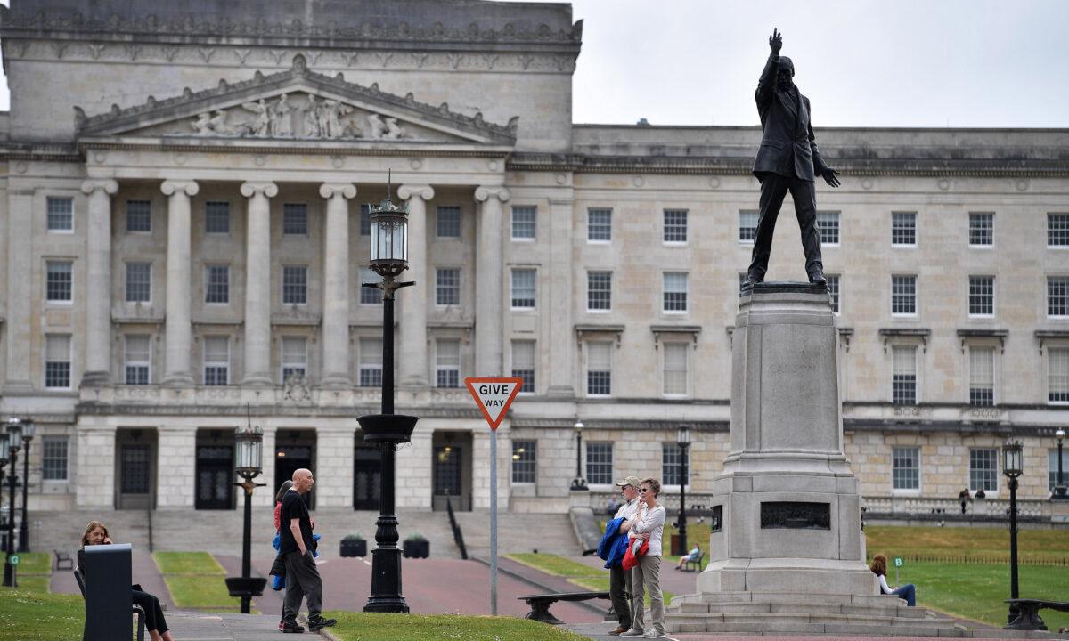 People in front of Stormont House in Belfast, Northern Ireland, on May 19, 2020. (Charles McQuillan/Getty Images)