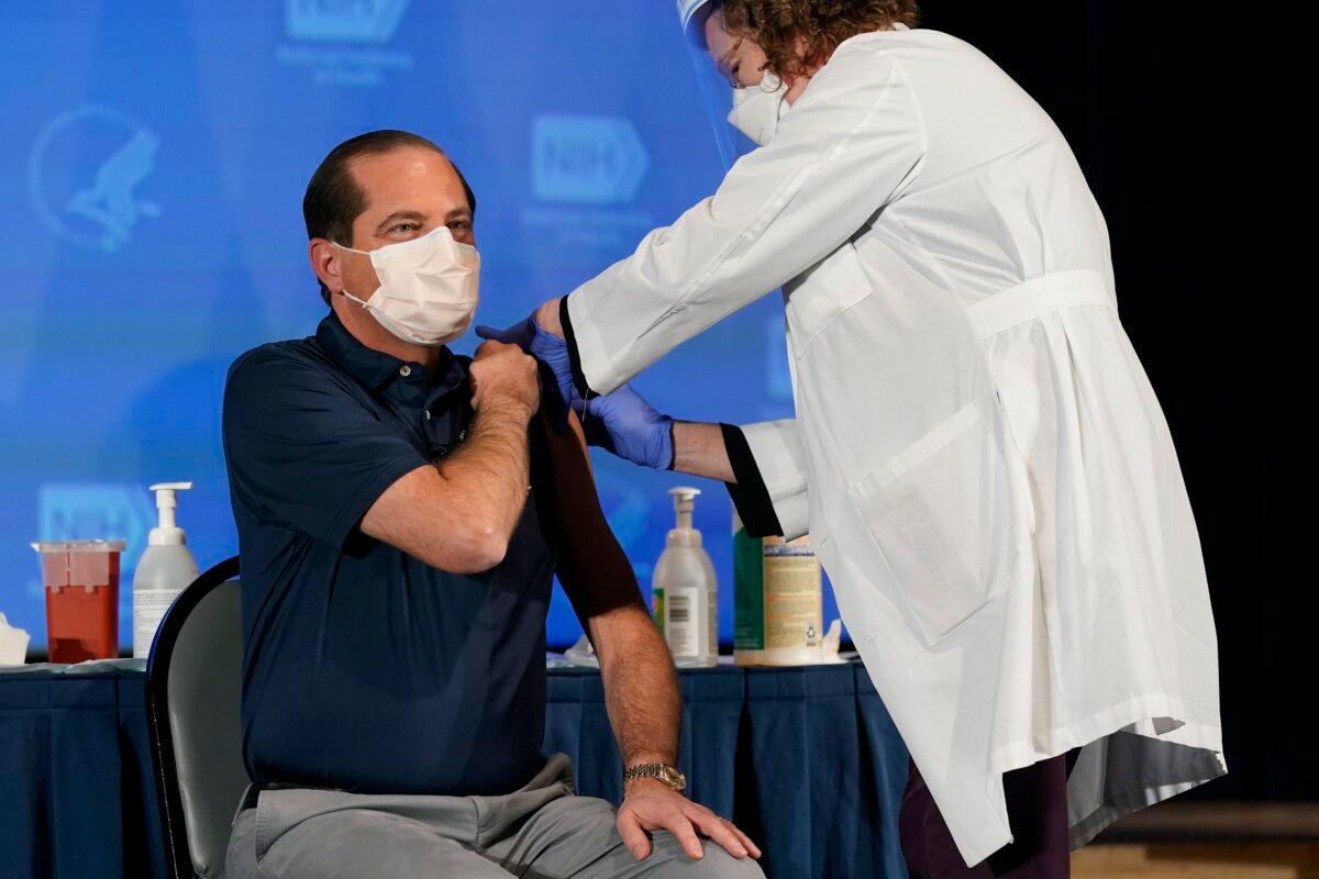 Secretary of Health and Human Services Alex Azar receives a COVID-19 vaccine, at the National Institutes of Health in Bethesda, Md., on Dec. 22, 2020. (Patrick Semansky/Pool/AFP via Getty Images)