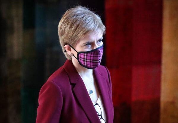 Scottish First Minister Nicola Sturgeon arrives to update MSPs on any changes to the COVID-19 five-level system in Scotland at the parliament in Holyrood, Edinburgh, on Dec. 15, 2020. (Andrew Milligan - Pool/Getty Images)