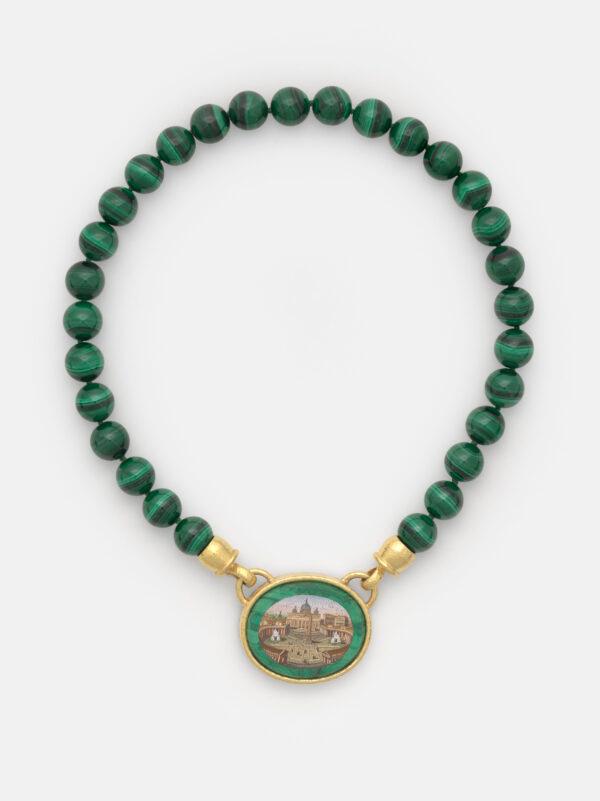 "St. Peter’s Square, Rome," 19th century. Micromosaic reset in gold as a pendant, with malachite border; 1 1/4 inches by 1 5/8 inches, suspended on 1/2 inch malachite bead necklace; 17 inches. Collection of Elizabeth Locke. (Travis Fullerton/Virginia Museum of Fine Arts)