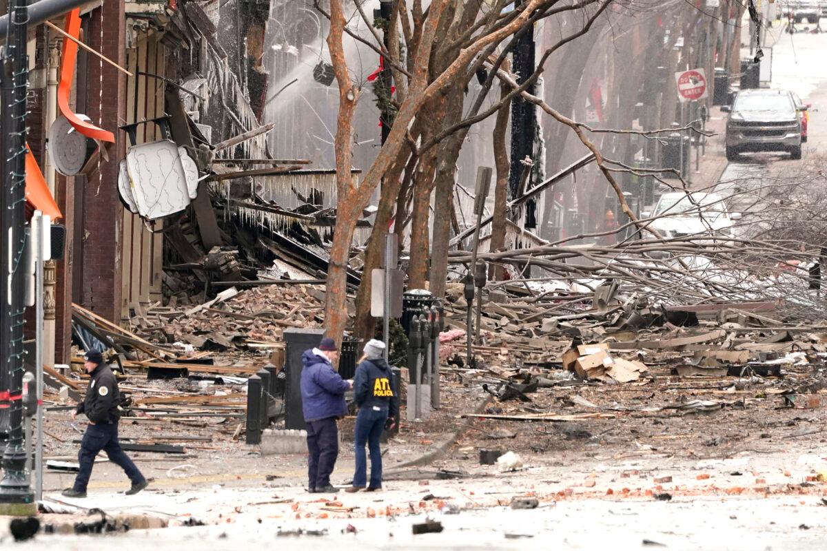  Emergency personnel work near the scene of an explosion in downtown Nashville, Tenn., on Dec. 25, 2020. (Mark Humphrey/AP Photo)
