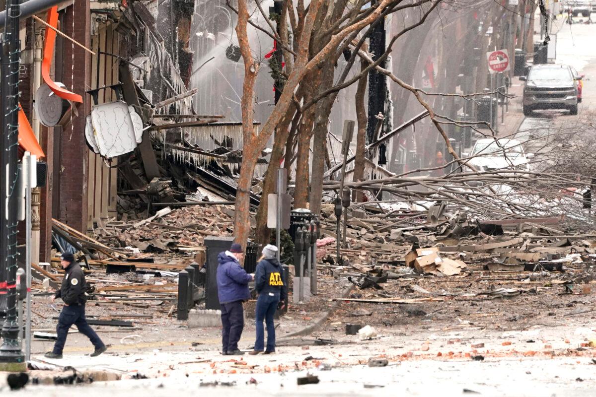 Emergency personnel work near the scene of an explosion in downtown Nashville, Tenn., on Dec. 25, 2020. (Mark Humphrey/AP Photo)