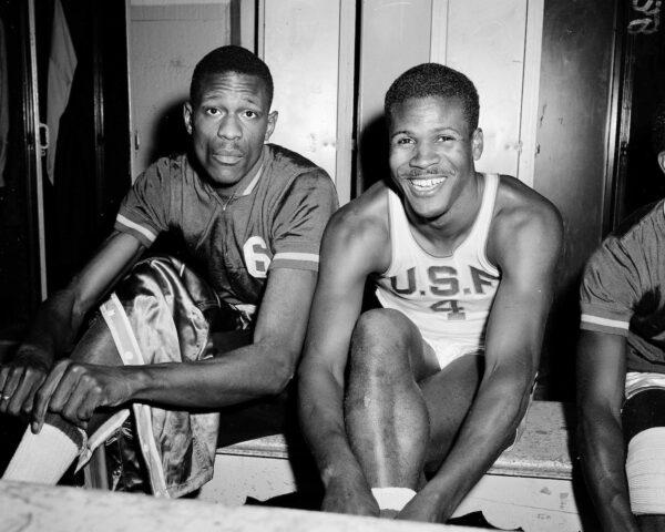 K.C. Jones, captain of the University of San Francisco Dons, right, is shown with teammate Bill Russell, on March 1, 1956. (Robert Houston/AP)