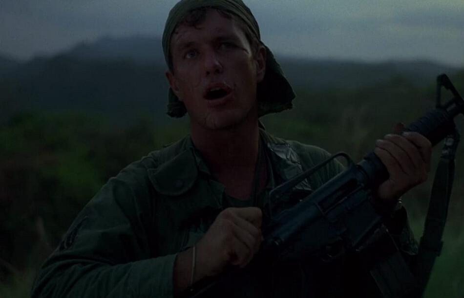 Sergeant Barnes (Tom Berenger) telling the troops to "lock and load," in "Platoon." (Orion Pictures)