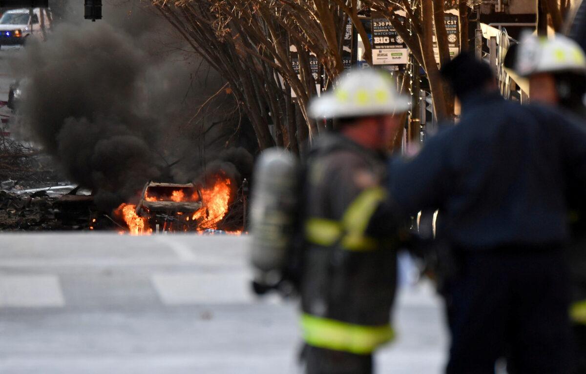 A vehicle burns near the site of an explosion in the area of Second and Commerce in Nashville Nashville, Tenn., on Dec. 25, 2020. (Andrew Nelles/Tennessean.com/USA Today Network via Reuters)