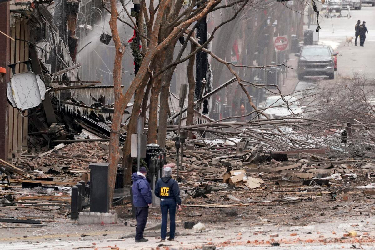 Emergency personnel work near the scene of an explosion in downtown Nashville, Tenn., on Dec. 25, 2020. (Mark Humphrey/AP Photo)