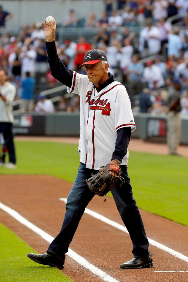 Phil Niekro throws out the ceremonial first pitch prior to game five of the National League Division Series between the Atlanta Braves and the St. Louis Cardinals at SunTrust Park in Atlanta, Ga., on Oct. 09, 2019. (Kevin C. Cox/Getty Images)