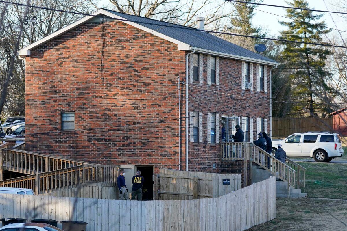 FBI and ATF agents search a home in connection to the Christmas bombing, in Nashville, Tenn., on Dec. 26, 2020. (Mark Humphrey/AP Photo)