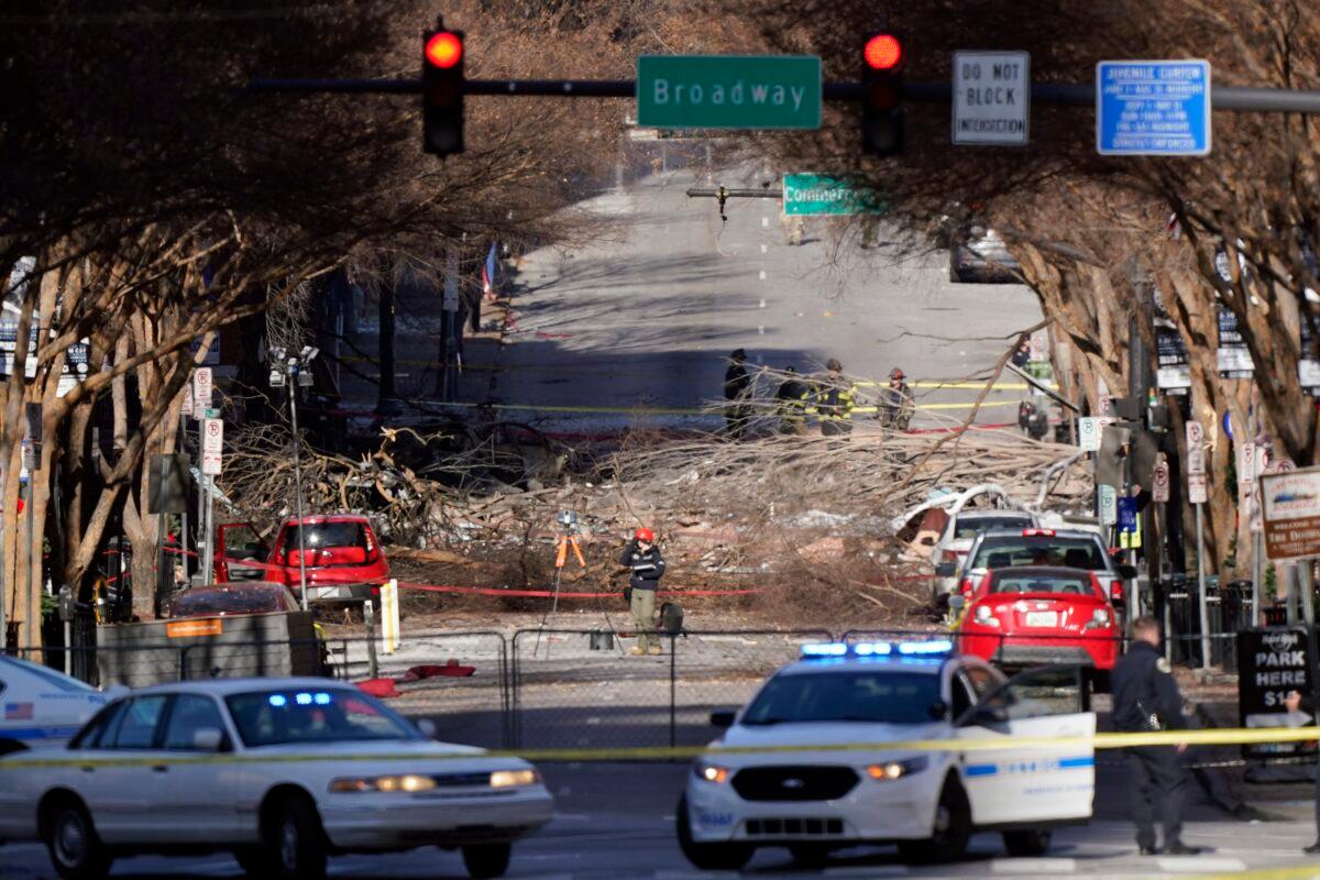 Investigators continue to examine the site of an explosion in Nashville, Tenn., on Dec. 27, 2020. (Mark Humphrey/AP Photo)