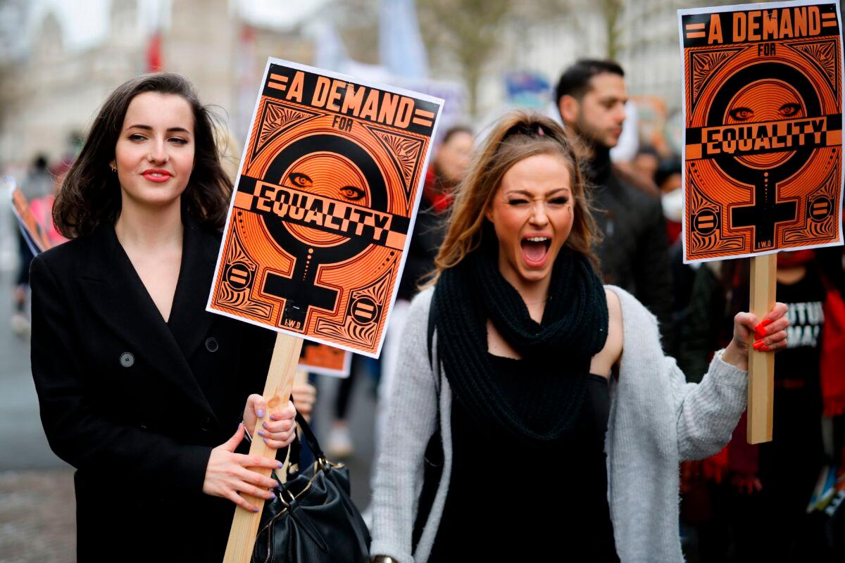 Demonstrators attend the "March4Women" during International Women's Day in London on March 8, 2020. (Tolga Akmen/AFP via Getty Images)