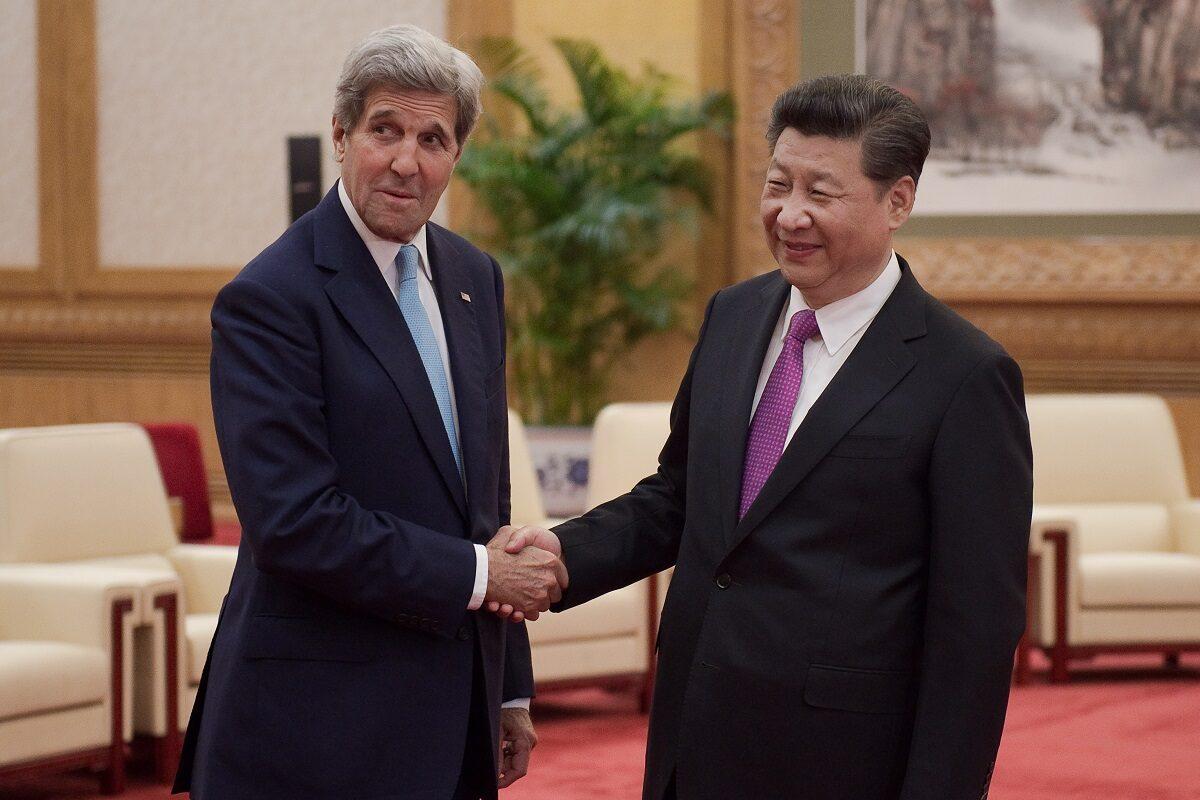 The then U.S. Secretary of State John Kerry shakes hands with Chinese leader Xi Jinping at the Great Hall of the People at the end of the eight round of U.S.-China strategic and economic dialogues in Beijing, China, on June 7, 2016. Kerry was in China for talks on a variety of issues including seeking diplomatic solutions for the South China Sea. (Nicolas Asfouri/Pool/Getty Images)