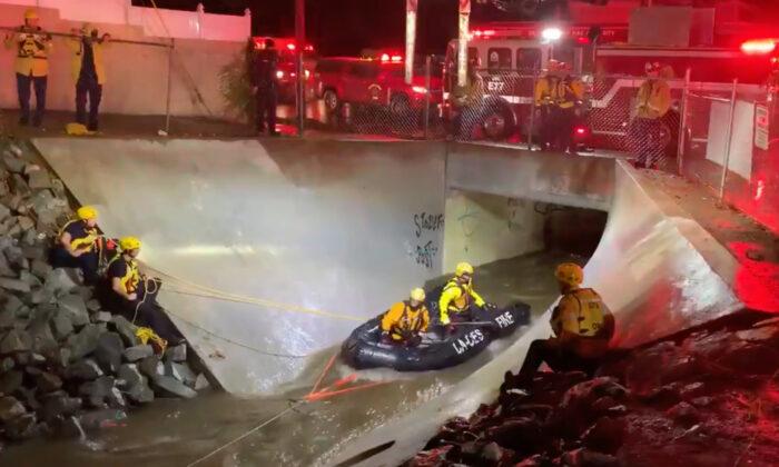OCFA Rescues 2 Adults From Santa Ana Flood Channel After Heavy Rain