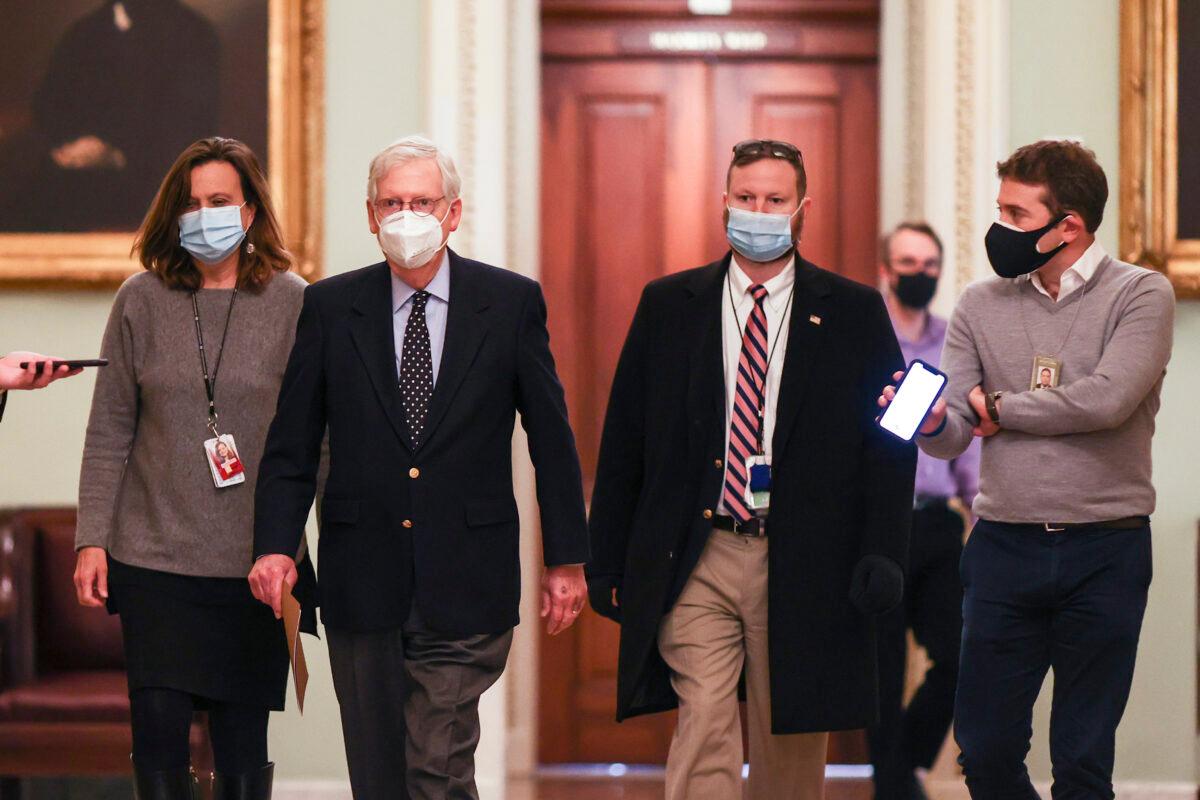 Senate Majority Leader Mitch McConnell (R-Ky.) heads to the Senate floor on Capitol Hill in Washington on Dec. 29, 2020. (Tasos Katopodis/Getty Images)