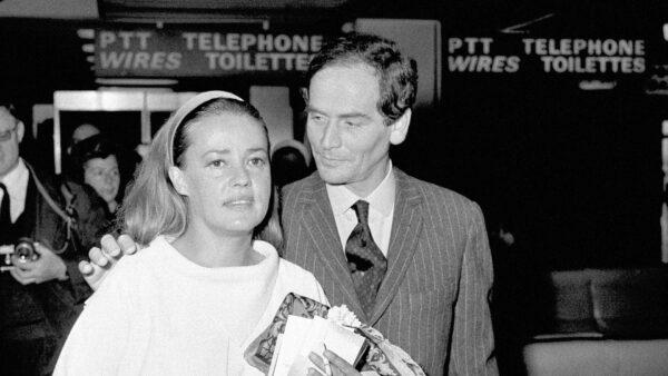 French actress Jeanne Moreau was welcomed by friend Pierre Cardin on her arrival at Orly airport in Paris, on May 26, 1965. (Pierre Godot/AP Photo)