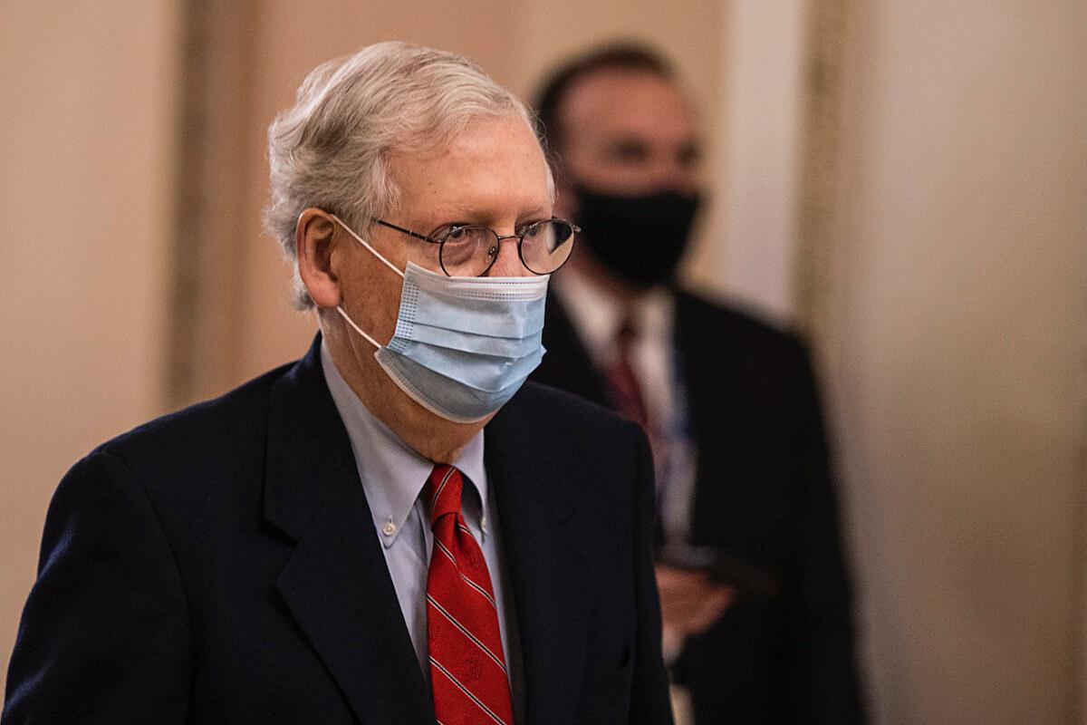 Senate Majority Leader Mitch McConnell (R-Ky.) walks to open up the Senate on Capitol Hill in Washington, on Dec. 20, 2020. (Tasos Katopodis/Getty Images)