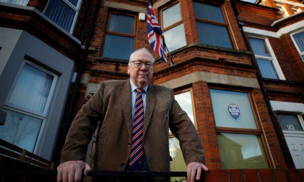 Unionist Orange order leader Mervyn Gibson poses for a photograph outside his house in Belfast, Northern Ireland, on Dec. 30, 2020. (Phil Noble/Reuters)