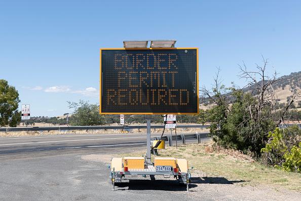 Border control signage at the Bethanga Bridge, between New South Wales and Victoria on the Riverina Highway on Dec. 29, 2020. (Brook Mitchell/Getty Images)