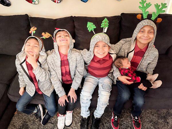 Daniel Onofre (R) sits with his four brothers: (left to right) Michael, Angel, Jason, and Adonis who is one month old. (Courtesy of Wendy Onofre)