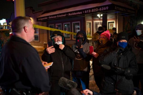Minneapolis Police spokesman John Elder briefed community members and others about the officer-involved shooting on Dec. 30, 2020. (Jeff Wheeler/Star Tribune via AP)