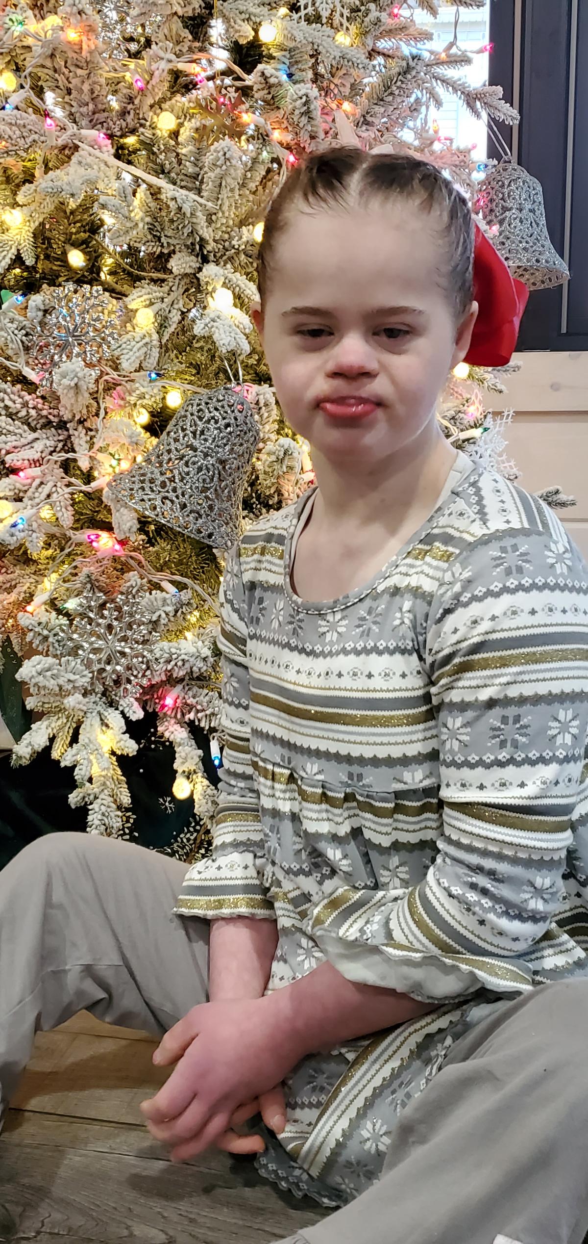 Sarah, a child with Down syndrome, was adopted by Tina's family. (Courtesy of <a href="https://www.facebook.com/robert.t.osborn">Tina Osborn</a>)