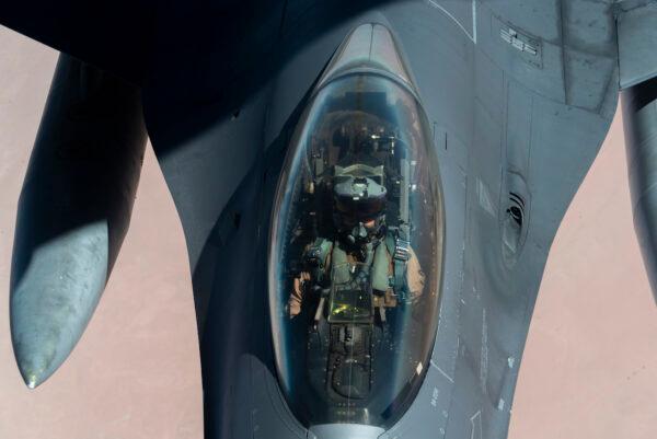 U.S. Air Force F-16 Fighting Falcon is aerial refueled by a KC-135 Stratotanker over the U.S. Central Command area of responsibility Dec. 30, 2020. (U.S. Air Force/Senior Airman Roslyn Ward)