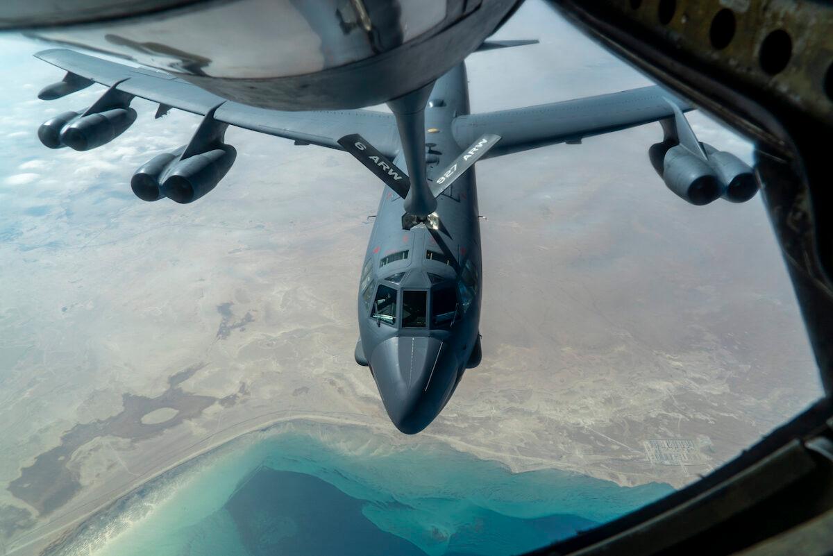 A U.S. Air Force B-52 from Barksdale Air Force Base is aerial refueled by a KC-135 Stratotanker over the U.S. Central Command area of responsibility on Dec. 30, 2020. (U.S. Air Force photo by Senior Airman Roslyn Ward)