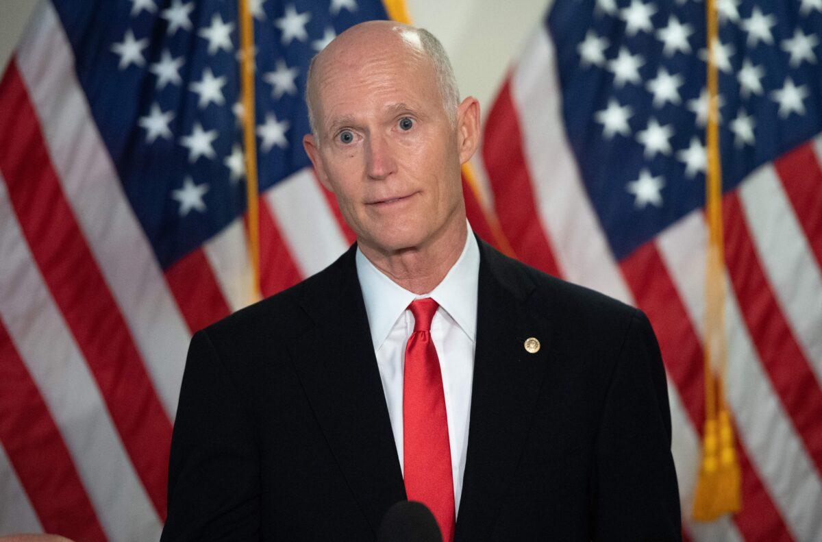 Sen. Rick Scott (R-Fla.) speaks to the media before the weekly Senate Republican lunch on Capitol Hill in Washington, on Nov. 10, 2020. (Saul Loeb/AFP via Getty Images)