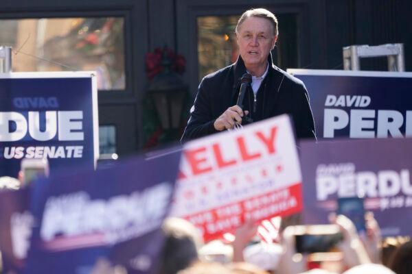 Sen. David Perdue (R-Ga) speaks during a campaign rally in Milton, Ga., on Dec. 21, 2020. (AP Photo/John Bazemore)