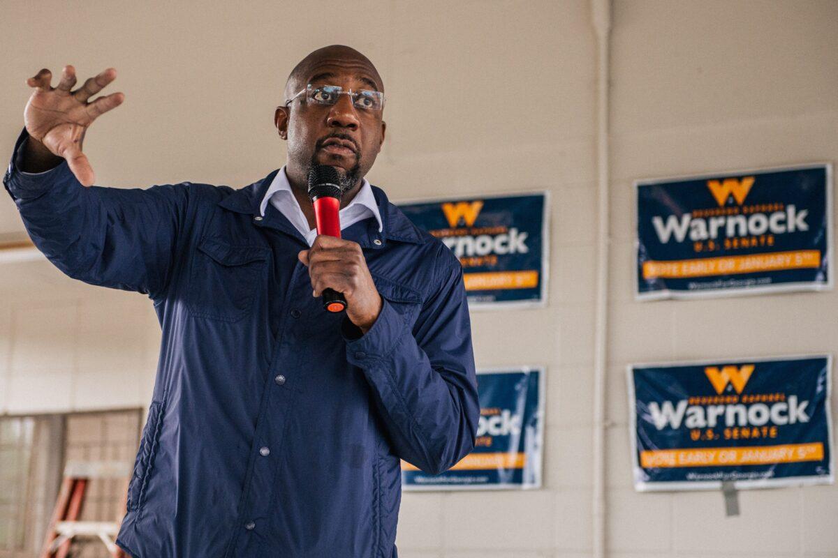 Georgia Democratic Senate candidate Raphael Warnock speaks to a drive-in rally in Culloden, Ga., on Jan. 1, 2021. (Brandon Bell/Getty Images)