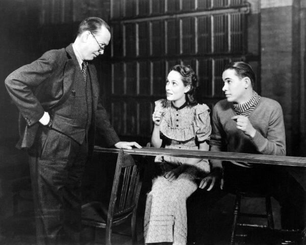 A scene from the original Broadway production of “Our Town” with Frank Craven (L)  as the Stage Manager, Martha Scott as Emily Webb, and John Craven as George Gibbs. (Public Domain)