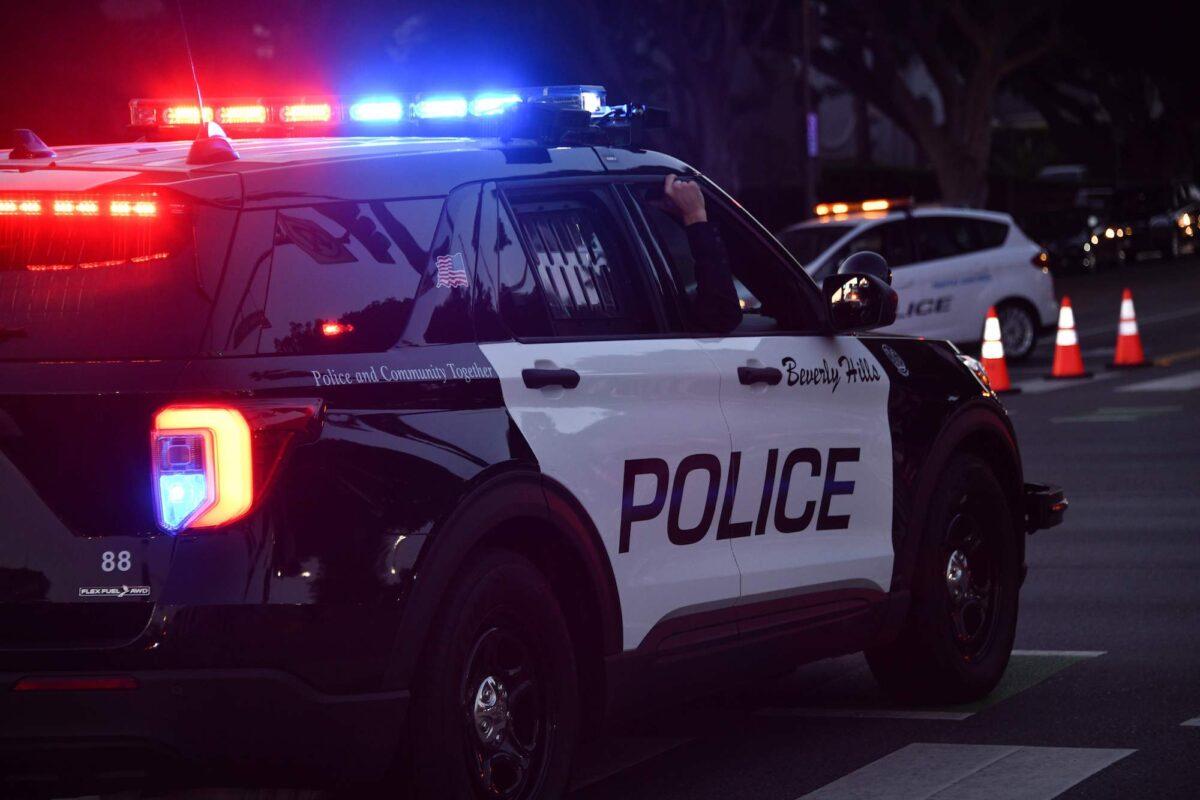 Police officers patrol in their car in Los Angeles, Calif., on Nov. 1, 2020. (Chris Delmas/AFP via Getty Images)