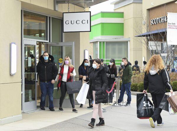 People shop at the Toronto Premium Outlets mall on Black Friday in Milton, Ont., on Nov. 27, 2020. (The Canadian Press/Nathan Denette)