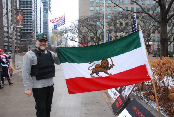 "Trump is fighting for the American people, for the world, and now it the time for us to fight for President Trump," said Nasser Pooli, an Iranian community leader who attended the rally. (Michelle Hu/The Epoch Times)