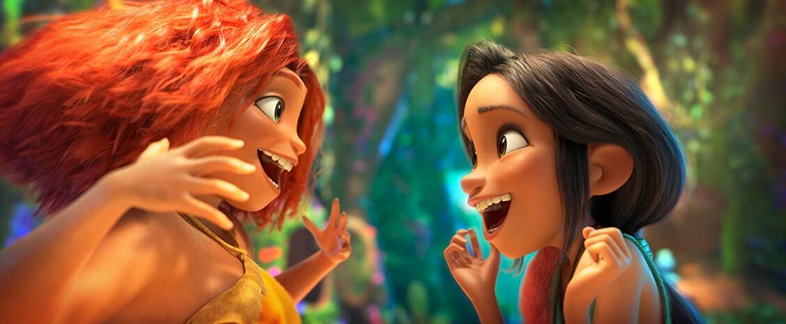Eep Crood (voiced by Emma Stone, L) and Dawn Betterman (Kelly Marie Tran) strike up a besties friendship, in "The Croods: A New Age." (Universal Pictures)