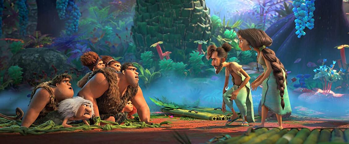 (L–R) Thunk (voiced by Clark Duke), Gran (Cloris Leachman), Sandy (Kailey Crawford), Ugga (Catherine Keener), Grug (Nicholas Cage), and Eep (Emma Stone), meet Phil Betterman (Peter Dinklage) and Hope Betterman (Leslie Mann), in "The Croods: A New Age." (Universal Pictures)