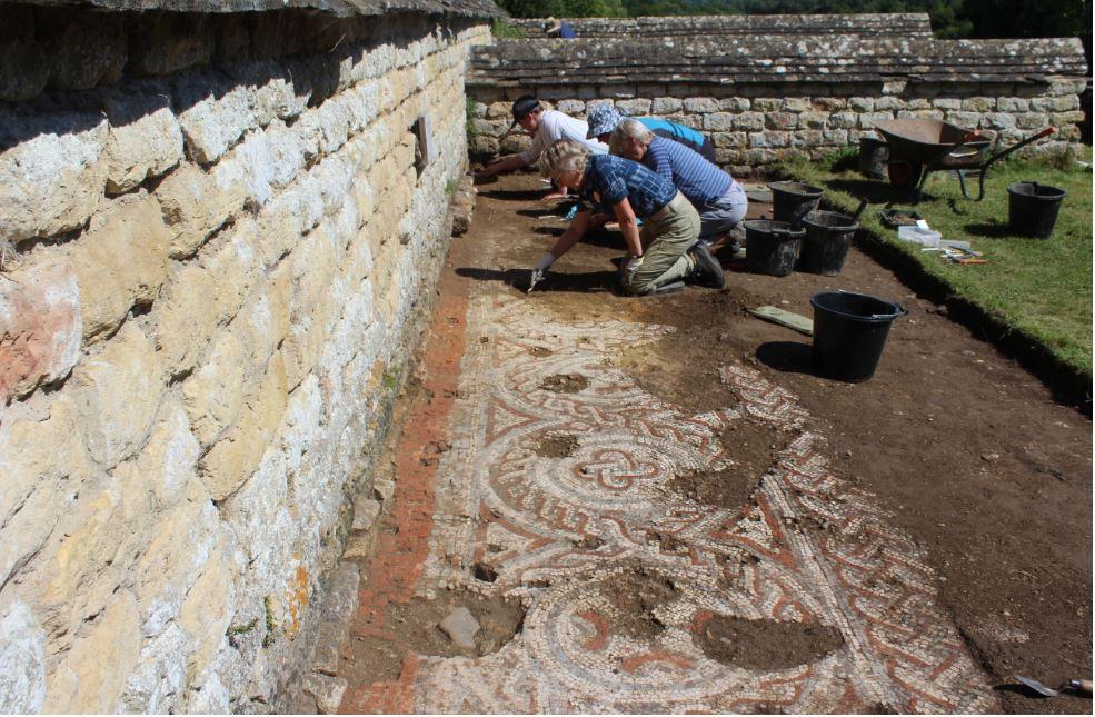 Volunteers uncovering the mosaic at Chedworth Roman Villa, England (Courtesy of <a href="https://www.nationaltrust.org.uk/">National Trust</a>)