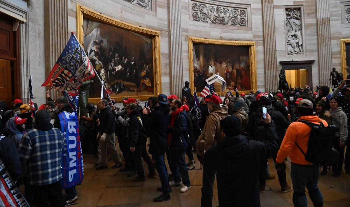 Supporters of President Donald Trump enter the U.S. Capitol's Rotunda in Washington on Jan. 6, 2021. (Saul Loeb/AFP via Getty Images)