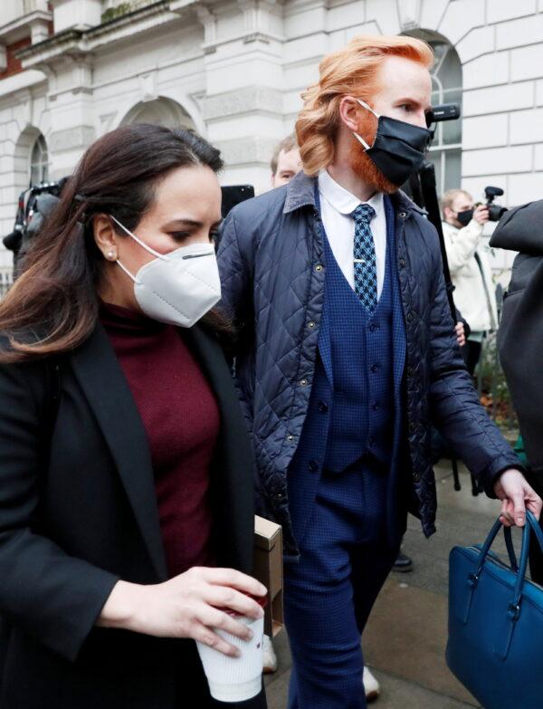 Stella Morris, partner of WikiLeaks founder Julian Assange and WikiLeaks Ambassador Joseph Farrell arrive at the Westminster Magistrates Court ahead of a hearing as lawyers for WikiLeaks founder Julian Assange seek bail for their client in London, Britain on Jan. 6, 2021. (Matthew Childs/Reuters)