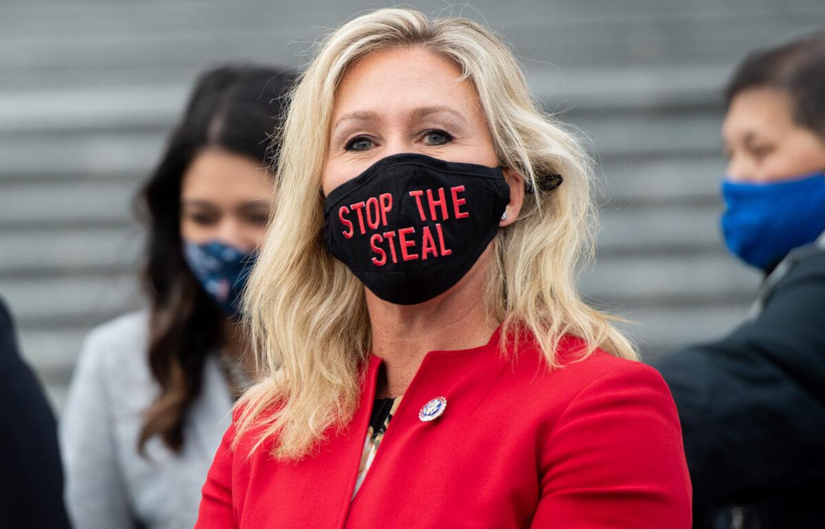 Rep. Marjorie Taylor Greene (R-Ga.) is seen while speaking with fellow first-term Republican members of Congress on the steps of the US Capitol in Washington on Jan. 4, 2021. (Saul Loeb/AFP via Getty Images)