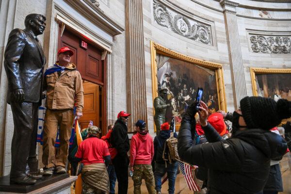 A group of protesters enter the U.S. Capitol Rotunda in Washington on Jan. 6, 2021. (Saul Loeb/AFP via Getty Images)