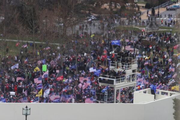 Protesters gather outside the U.S. Capitol, in Washington, on Jan. 6, 2021. Picture taken through a glass inside the Capitol. (Jonathan Ernst/Reuters)
