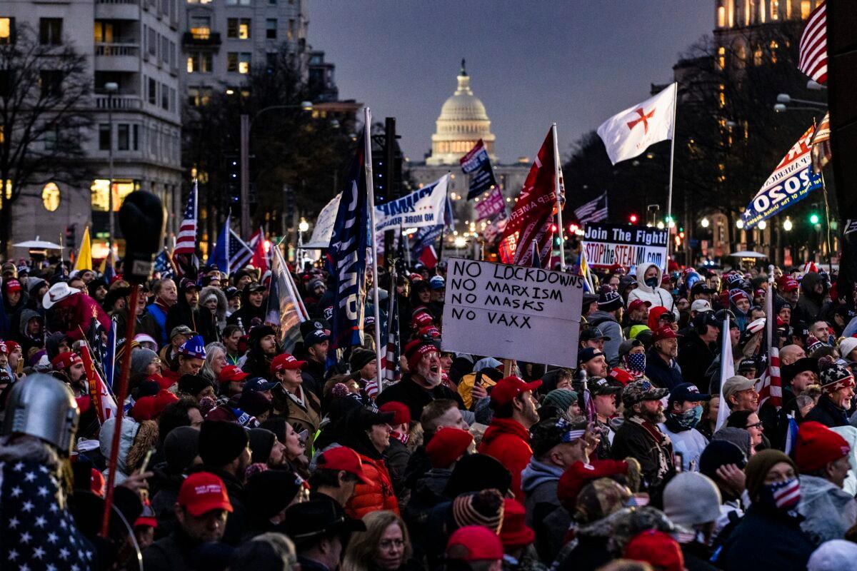 Supporters of President Donald Trump gather in the rain for a rally at Freedom Plaza in Washington on Jan. 5, 2021. (Samuel Corum/Getty Images)
