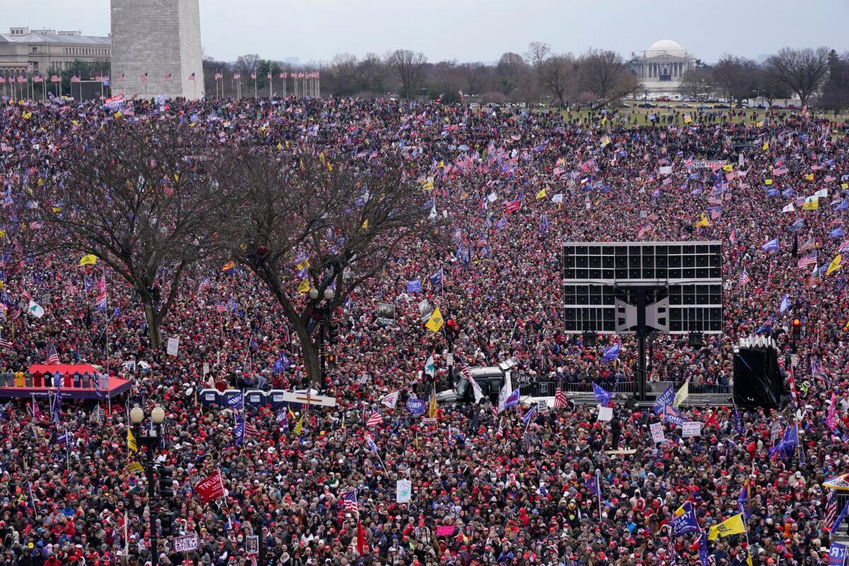 With the Washington Monument in the background, people attend a rally in support of President Donald Trump near the White House in Washington on Jan. 6, 2021. (Jacquelyn Martin/AP Photo)