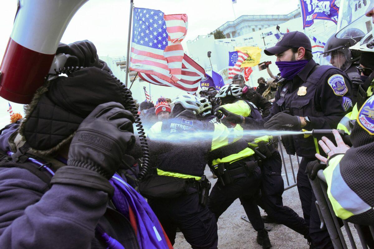 Protesters clash with police officers in front of the U.S. Capitol Building in Washington on Jan. 6, 2021. (Stephanie Keith/Reuters)