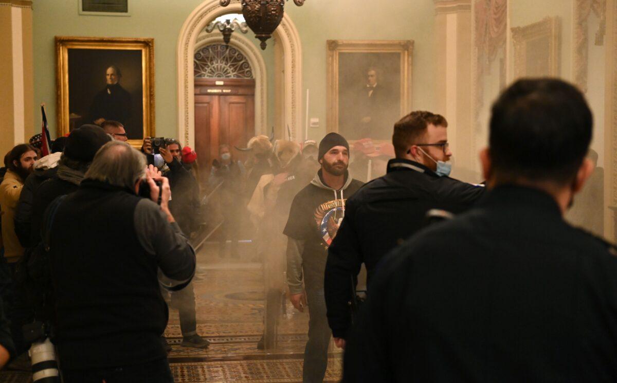 A group of protesters enter the U.S. Capitol in Washington on Jan. 6, 2021. (Saul Loeb/AFP via Getty Images)