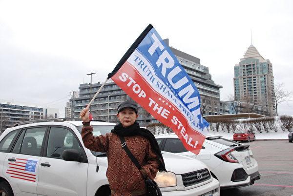 Sheng Xue, vice president of the Federation for a Democratic China, at the Jan. 6 rally in Toronto. (Michelle Hu/The Epoch Times)