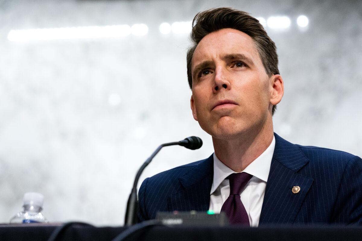 Sen. Josh Hawley (R-Mo.) listens while Supreme Court nominee Judge Amy Coney Barrett testifies before the Senate Judiciary Committee on the second day of her Supreme Court confirmation hearing on Capitol Hill in Washington, on Oct. 13, 2020. (Anna Moneymaker-Pool/Getty Images)