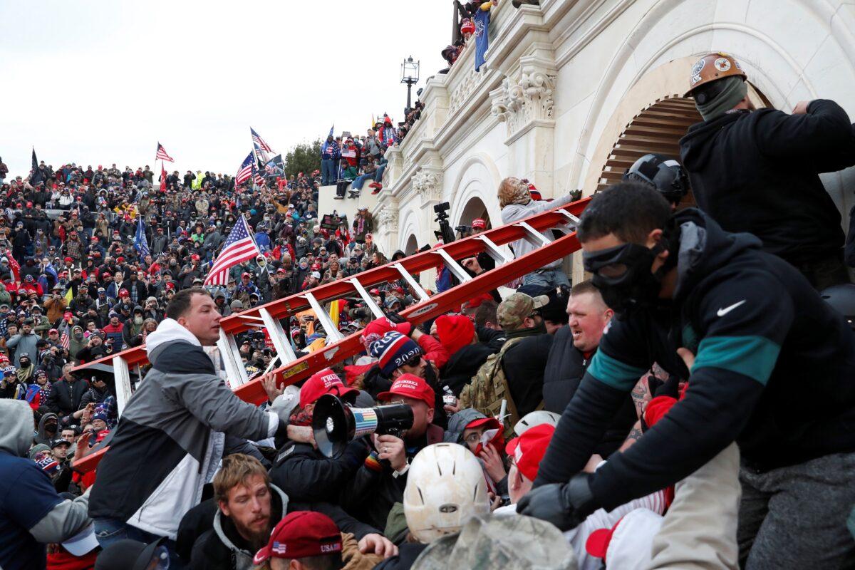 Protesters storm into the U.S. Capitol during a rally to contest the certification of the 2020 U.S. presidential election results by Congress, in Washington on Jan. 6, 2021. (Shannon Stapleton/Reuters)