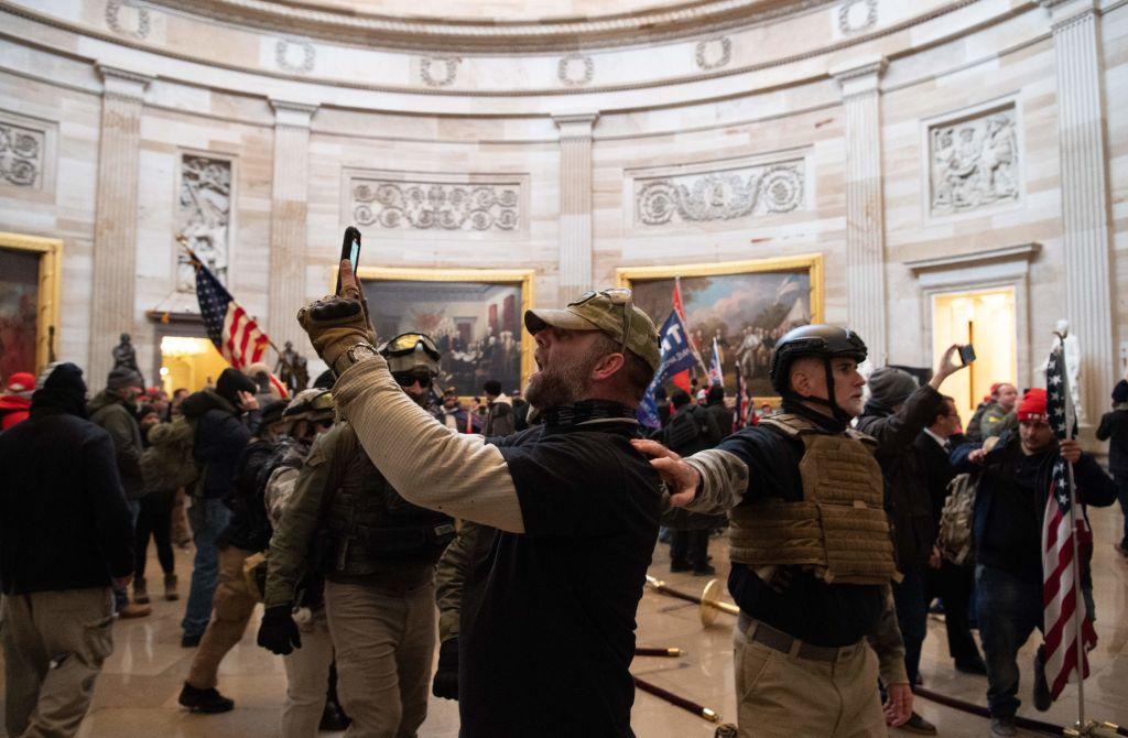 Protesters are seen taking pictures inside the U.S. Capitol in Washington, on Jan. 6, 2021. (Saul Loeb/AFP via Getty Images)